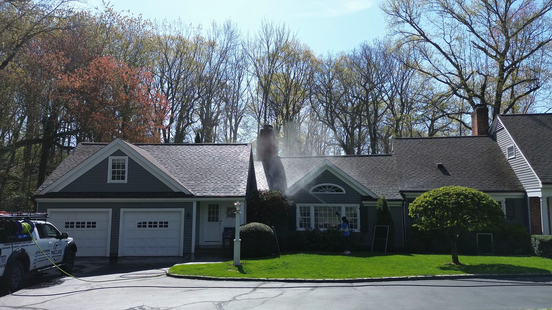 Connecticut home during an exterior wash, seen from the street
